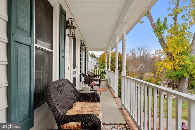 balcony featuring a porch