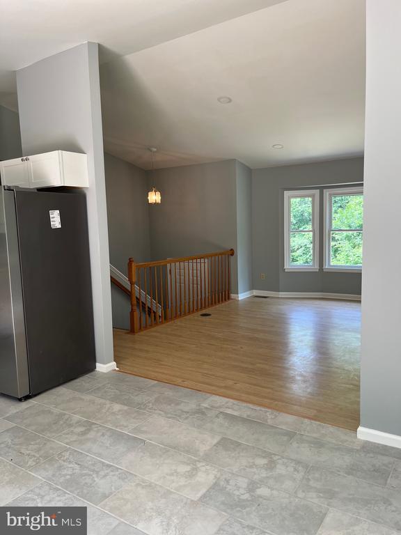 spare room with light wood-type flooring