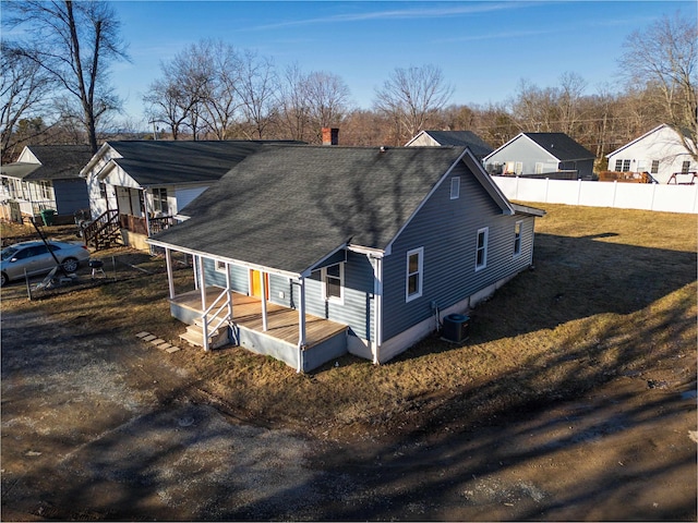 back of property with cooling unit