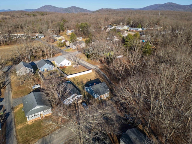 drone / aerial view featuring a mountain view