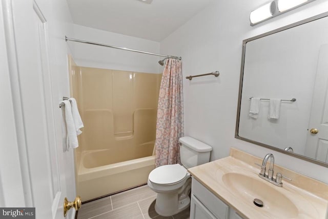 full bathroom with shower / bath combo with shower curtain, toilet, and vanity