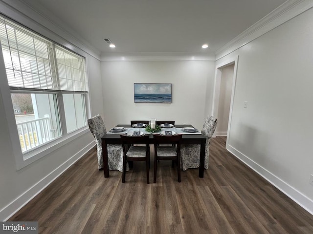 dining area featuring recessed lighting, dark wood-type flooring, baseboards, and ornamental molding