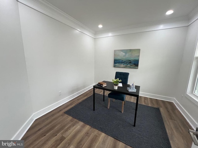 office area with baseboards, dark wood-type flooring, and ornamental molding