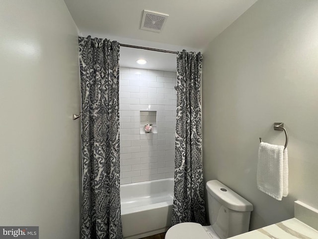 bathroom with visible vents, shower / bathtub combination with curtain, and toilet