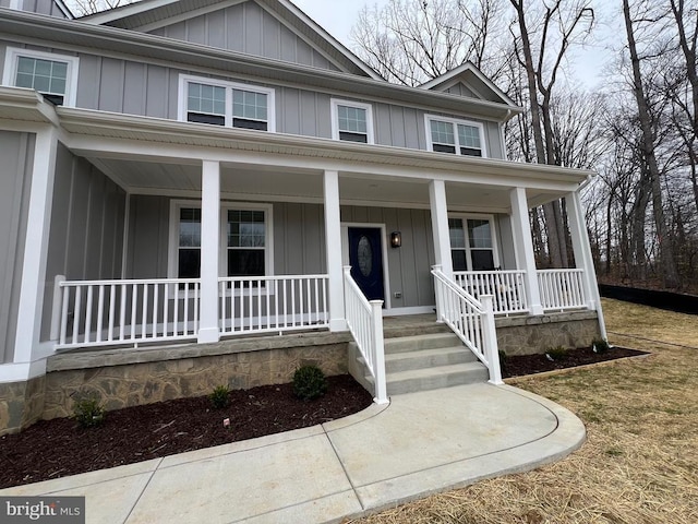 view of front of home with a porch and board and batten siding