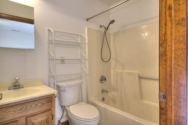 full bathroom featuring vanity, toilet, and tub / shower combination