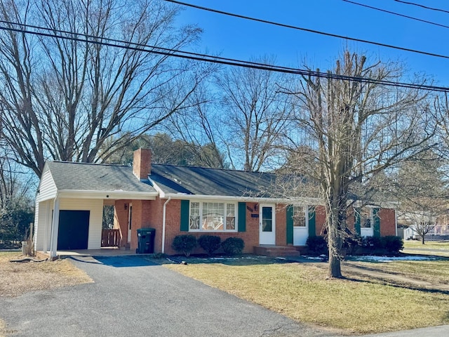 single story home with a front yard