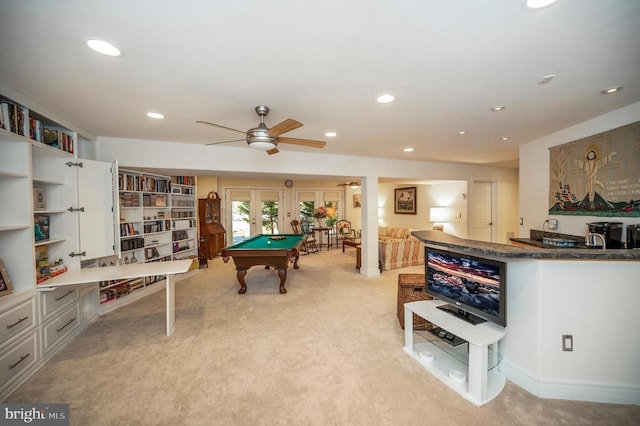 recreation room featuring billiards, light colored carpet, french doors, and ceiling fan