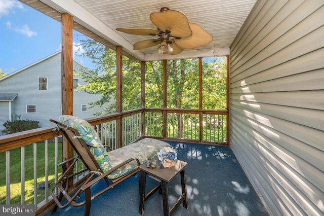 sunroom / solarium with ceiling fan