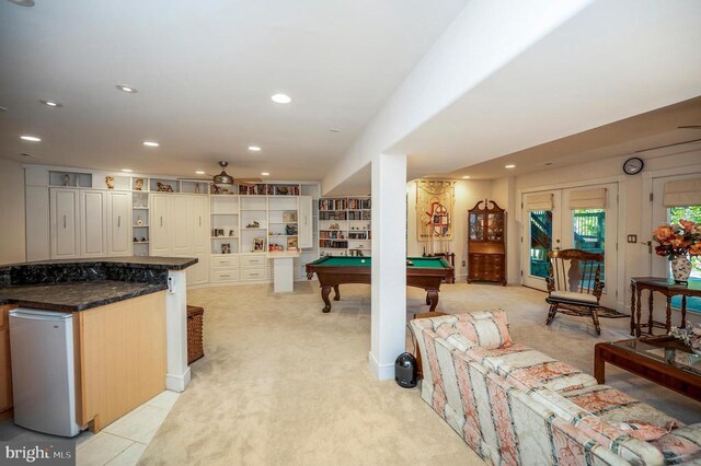 recreation room featuring ceiling fan, pool table, and light colored carpet