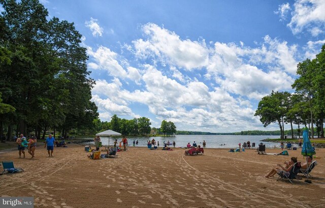 view of community with a water view