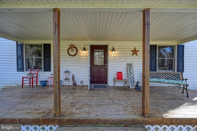 entrance to property with a porch