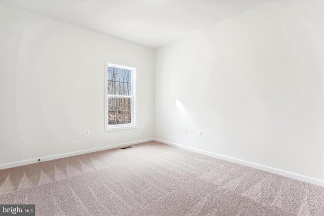 view of carpeted spare room