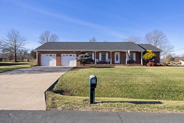 ranch-style house featuring a garage, covered porch, and a front lawn