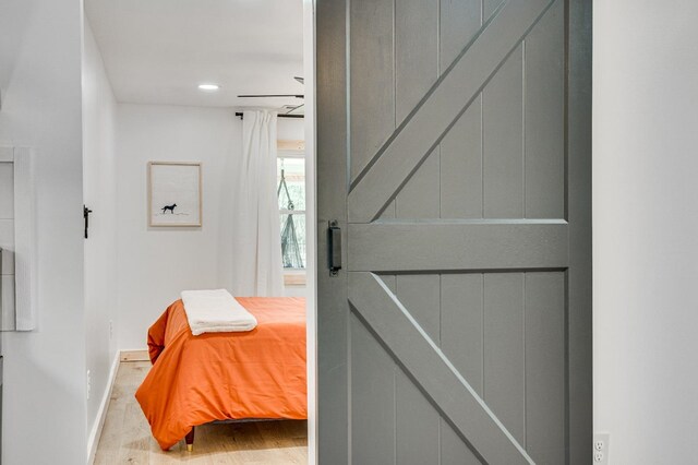 bedroom featuring hardwood / wood-style flooring