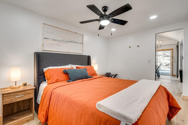 bedroom featuring ceiling fan and light wood-type flooring