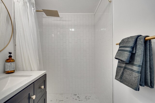 bathroom with vanity and a shower with curtain