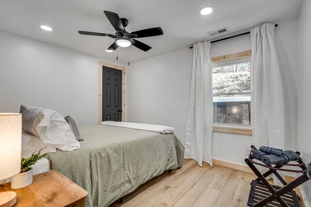 bedroom featuring ceiling fan and light wood-type flooring