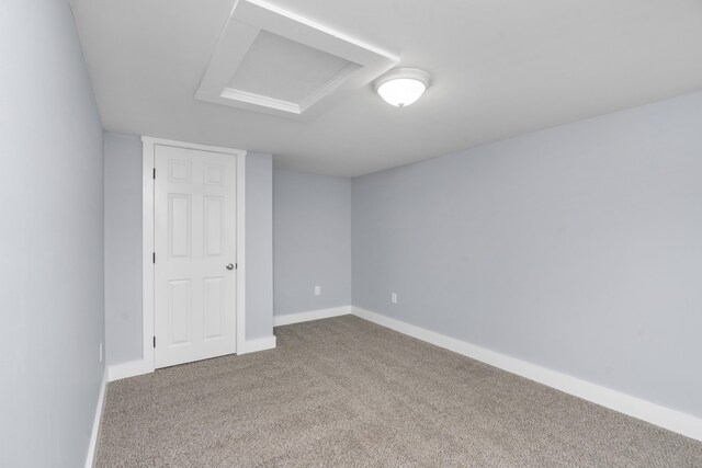 interior space featuring attic access and baseboards