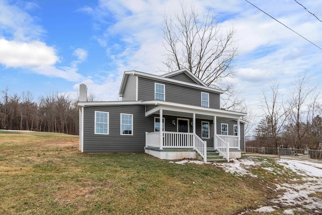 view of front of house with covered porch, a chimney, fence, and a front lawn