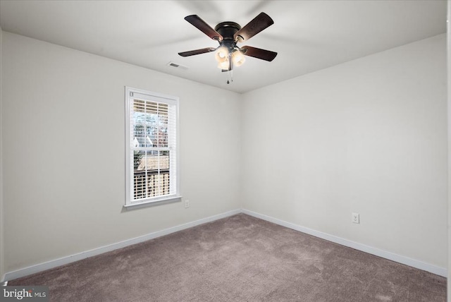 carpeted empty room with ceiling fan