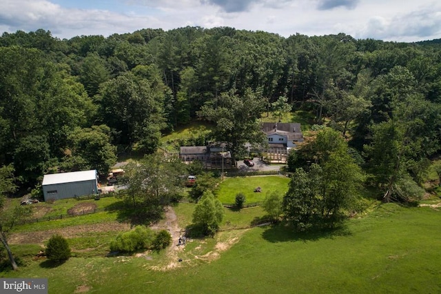 aerial view with a wooded view