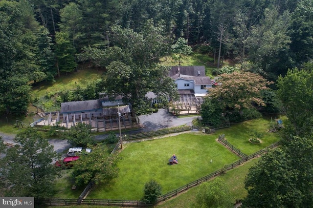 bird's eye view featuring a forest view