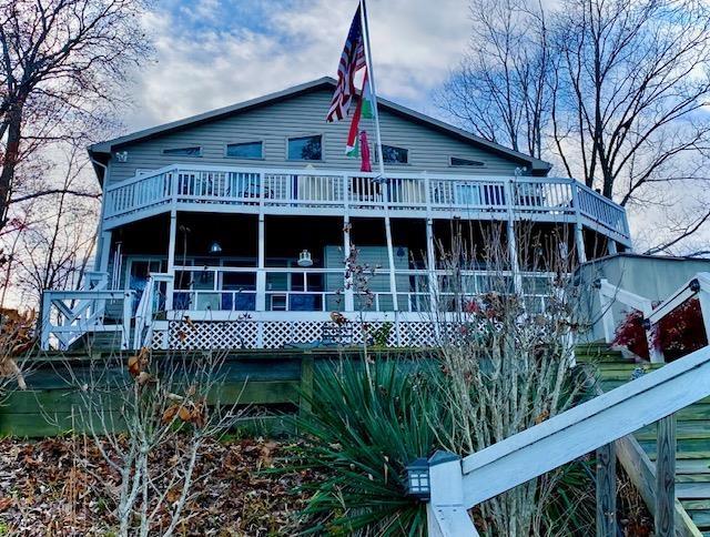 view of front of property featuring a wooden deck