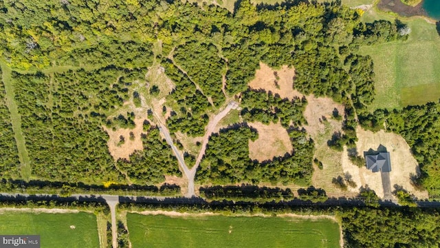 birds eye view of property featuring a rural view