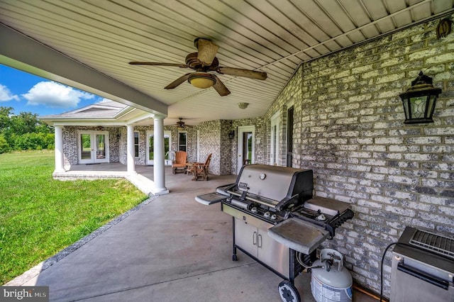 view of patio / terrace with a ceiling fan and french doors