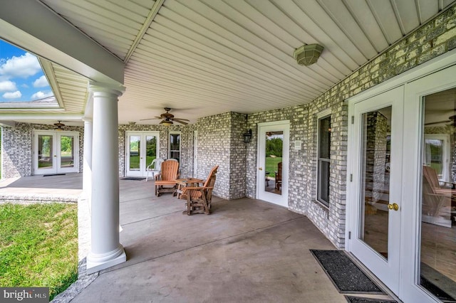 view of patio / terrace with a ceiling fan and french doors