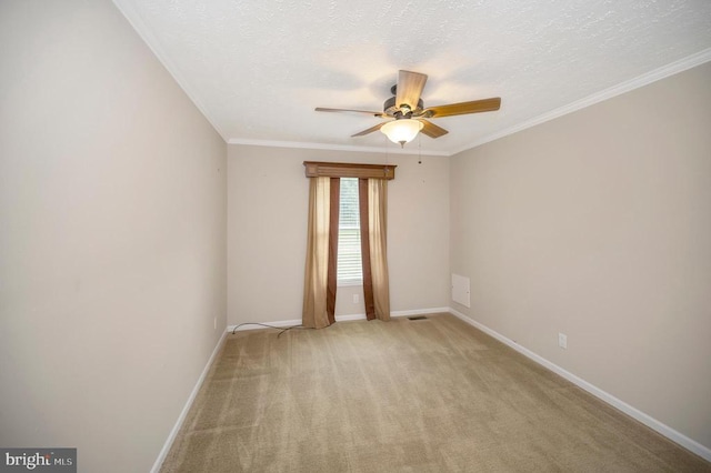 unfurnished room with light carpet, ornamental molding, and baseboards