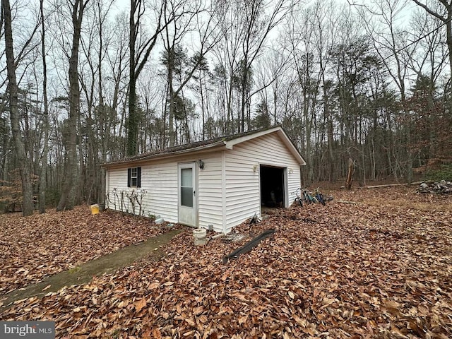 view of outbuilding featuring a garage