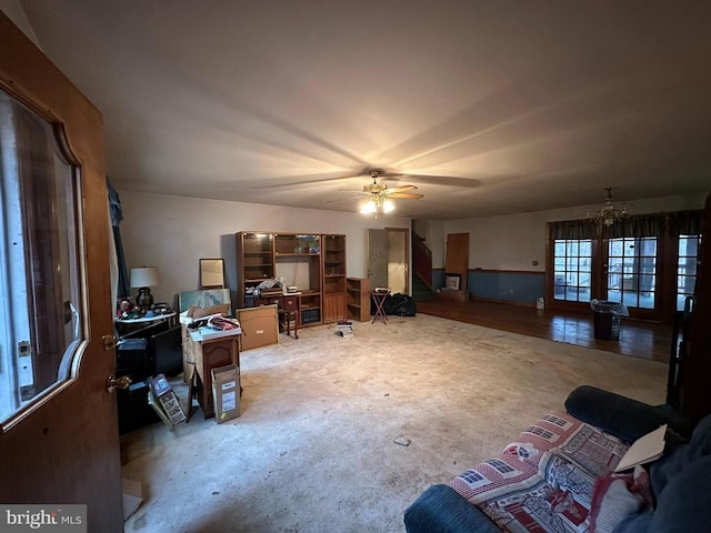 home office featuring french doors and ceiling fan