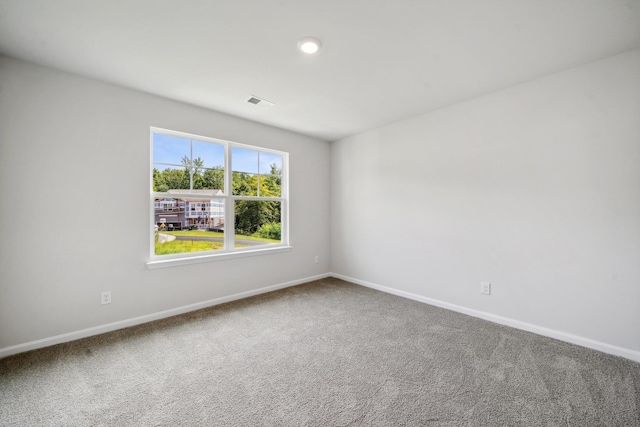 unfurnished room featuring carpet floors