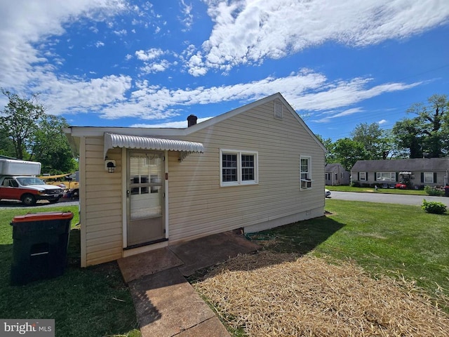 exterior space with a front lawn