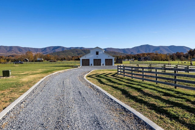 mountain view featuring a rural view