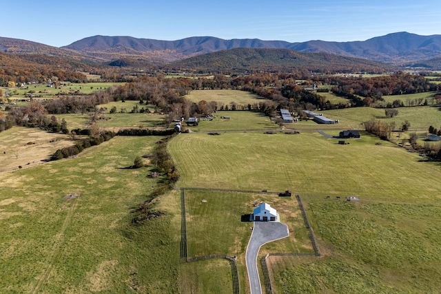 aerial view featuring a mountain view and a rural view