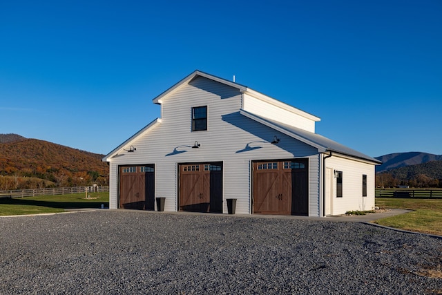 exterior space featuring a mountain view