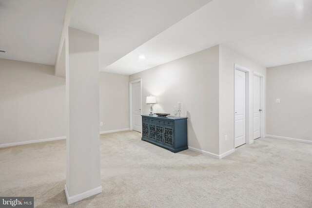 basement with light colored carpet