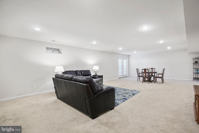 living room with light colored carpet