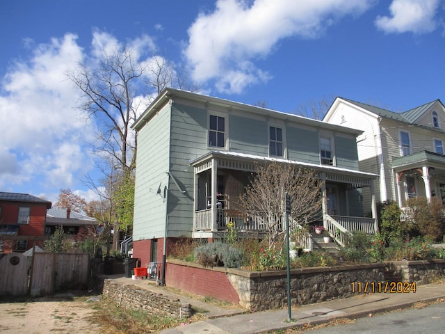 view of front property with covered porch