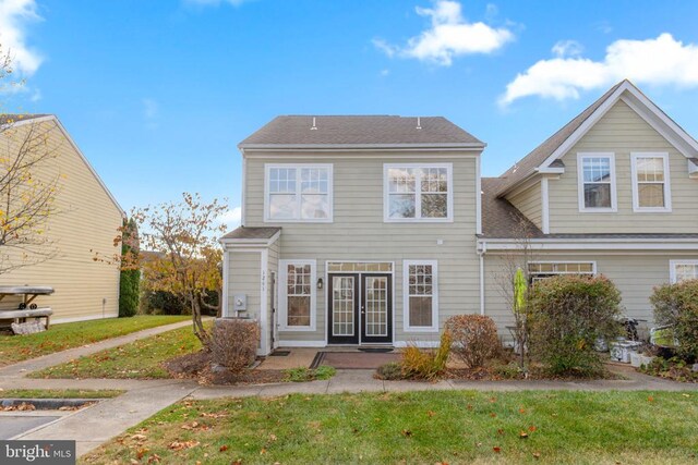 view of front of home with a front lawn