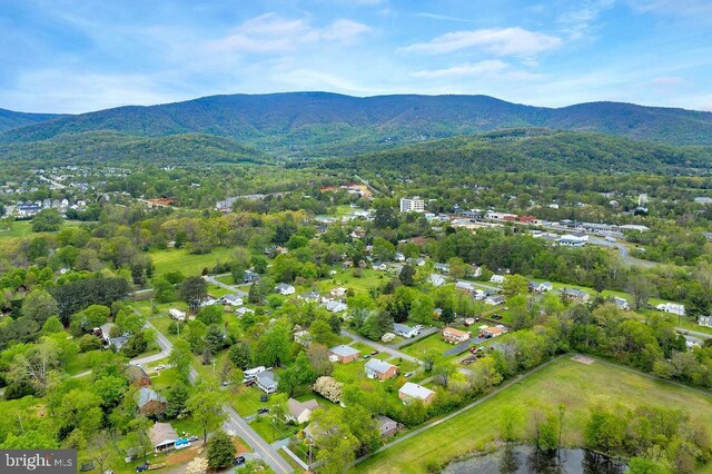 drone / aerial view featuring a mountain view