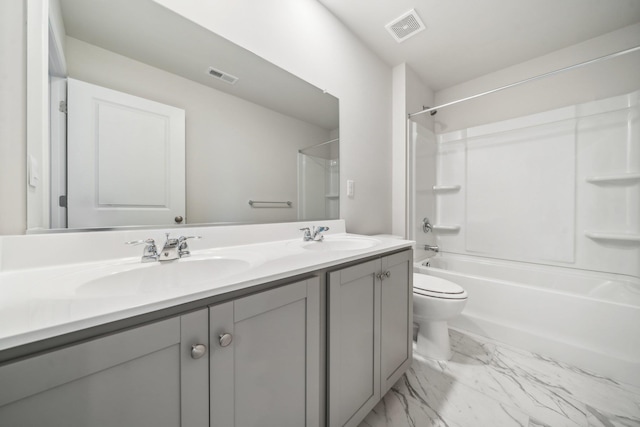 bathroom featuring double vanity, visible vents, toilet, and a sink