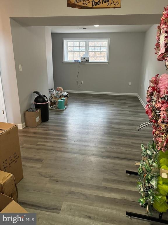 empty room featuring dark hardwood / wood-style flooring