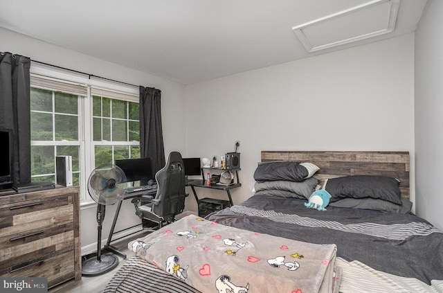 bedroom with wood-type flooring