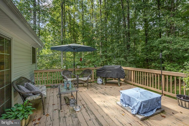 wooden terrace with area for grilling