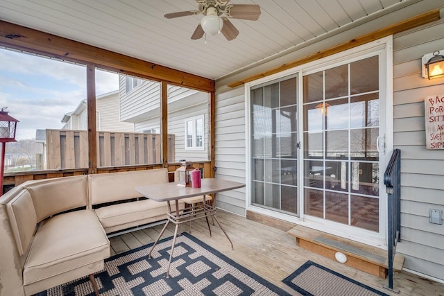 sunroom / solarium with ceiling fan