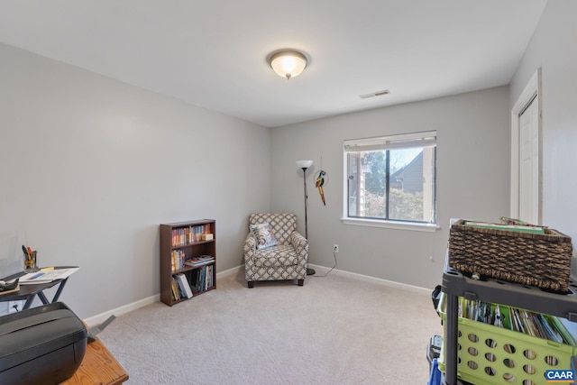 carpeted bedroom featuring visible vents and baseboards